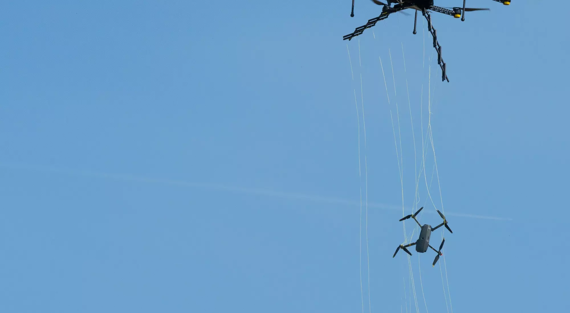 A drone hunter catching intruder into a net